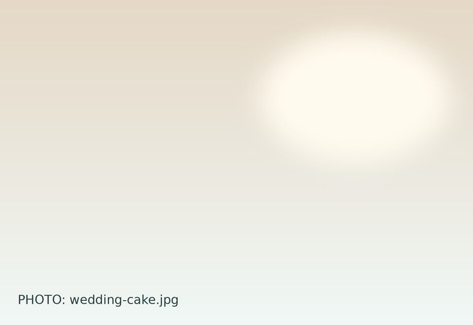 Wedding cake with pale flowers and delicate decoration